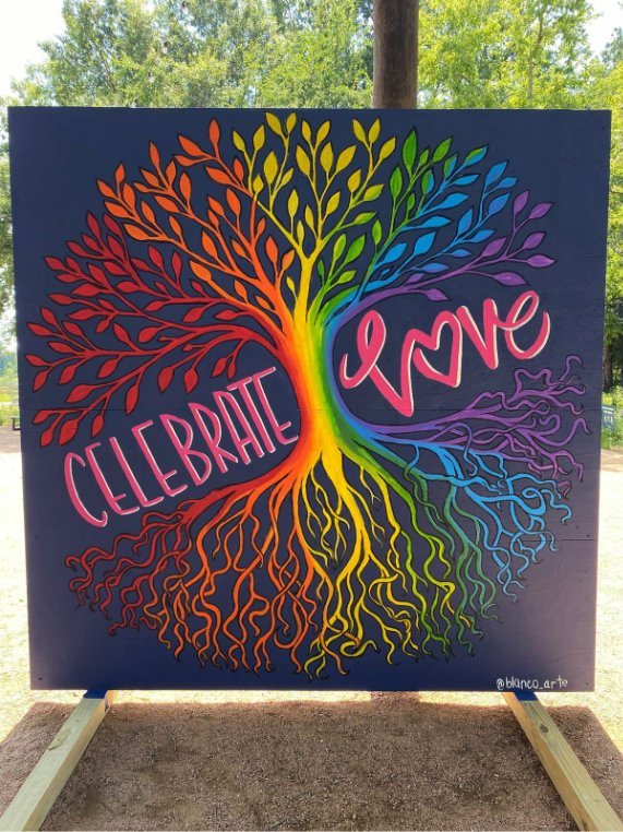 Rainbow tree of life panel with the words Celebrate Love